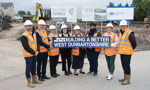 Representatives from West Dunbartonshire Council and contractors CCG at the site of new homes in Pappert 