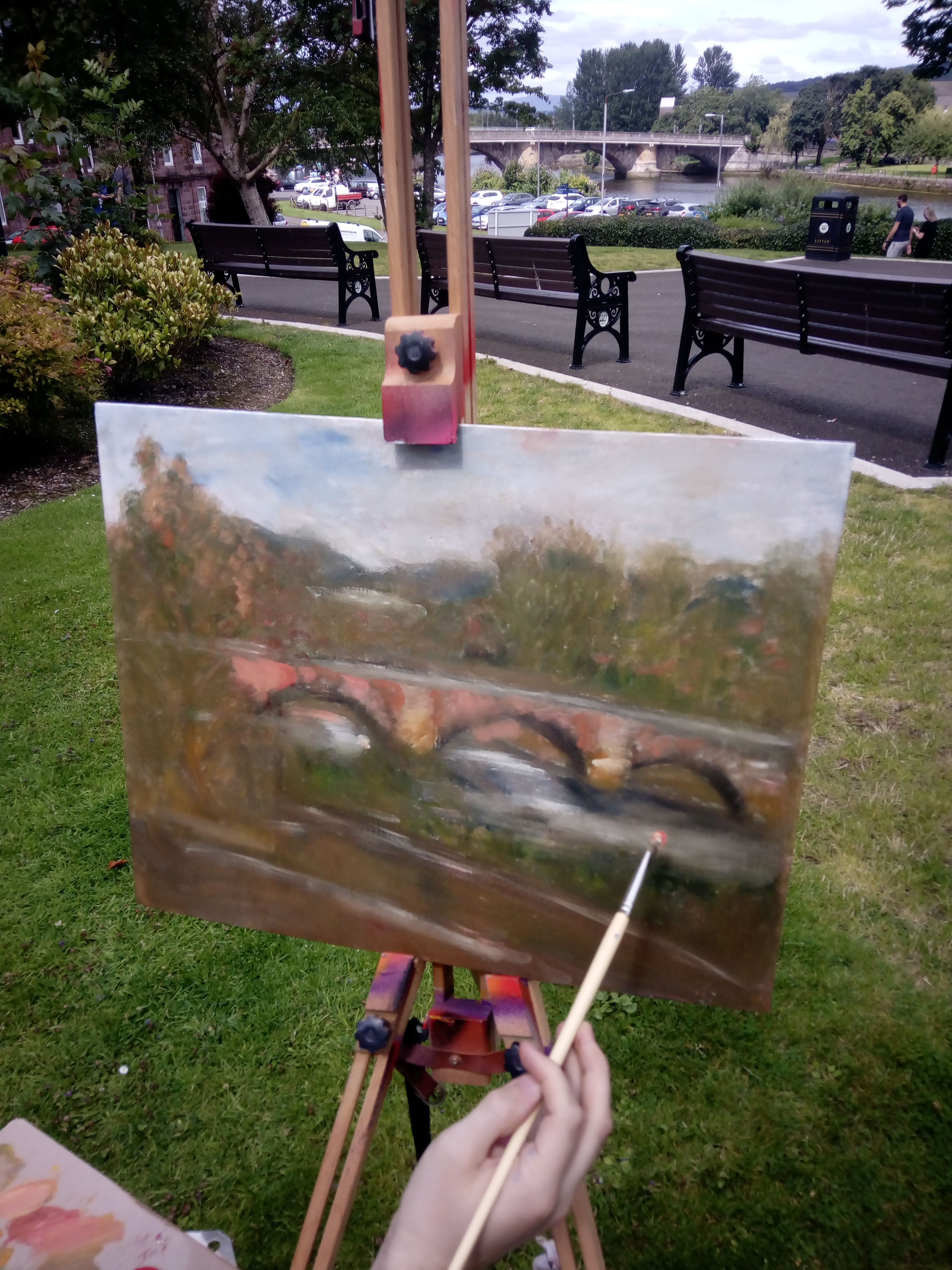image of volunteer painting the Old Bridge in Dumbarton