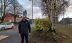 Councillor McBride stands outside Knoxland Primary School 