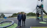 Convener of Infrastructure, Regeneration and Economic Development, Councillor David McBride and vice convener, Councillor Lawrence O'Neill and the refurbished play park in Brucehill