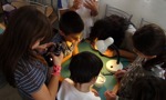 Children gathered learning science